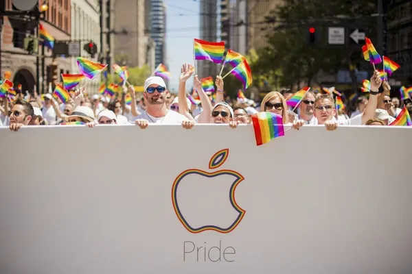 Noah-BergerHEADLINE-Apple-employees-carry-rainbow-