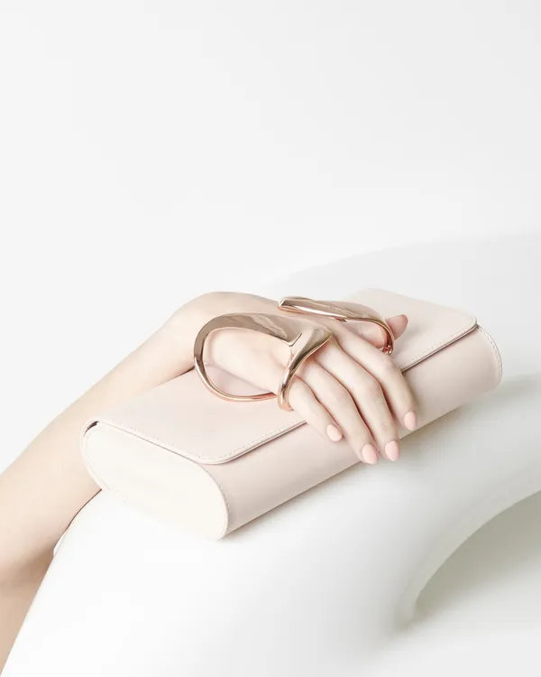 07-Perrin-Paris-Zaha-Hadid-Glove-Clutch-6.jpg