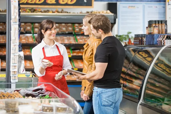 shutterstock_clerk_help_customer_167509160.jpg