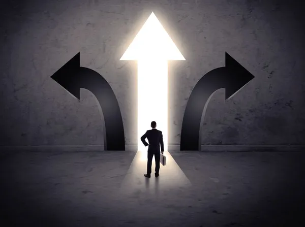 A businessman in doubt, having to choose between t