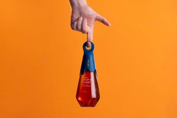 2019紅點-RD_美可特為當枝蜜設計的蜂蜜包裝簡潔俐落兼具功能性.jpg