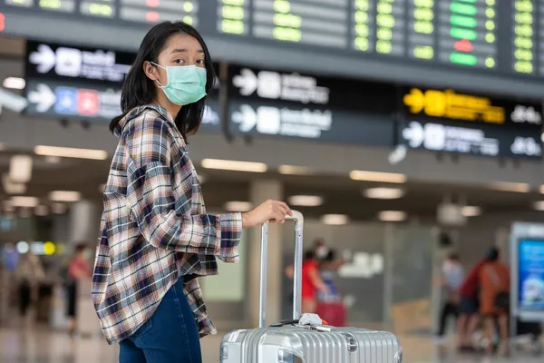 shutterstock_1666439269_airport_19_口罩_登機_行李_防疫.jpg