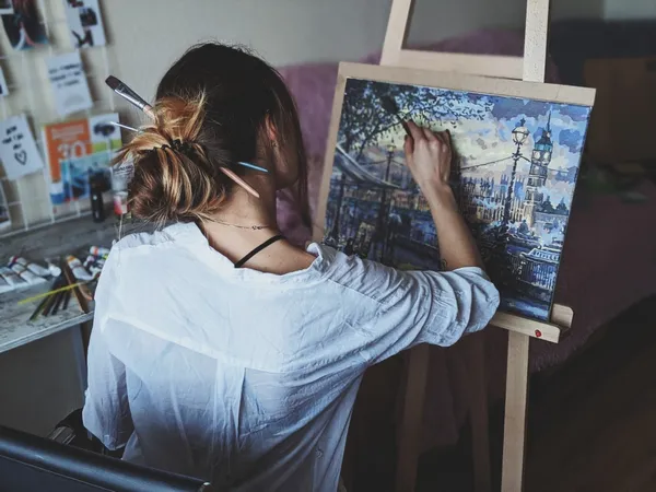 photo-of-woman-in-front-of-painting-3547625.jpg