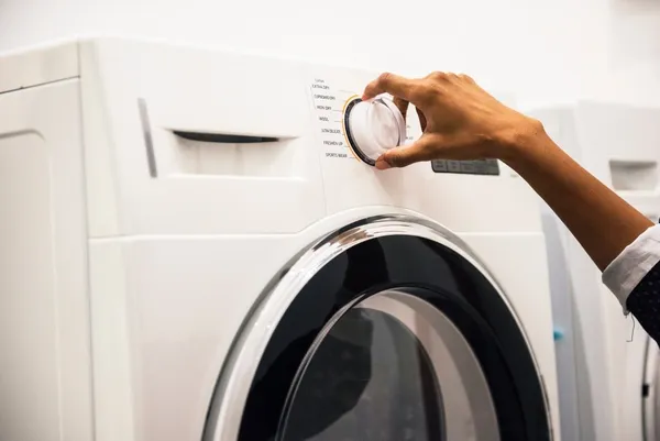 close_up_equipment_hand_housework_indoors_laundry_