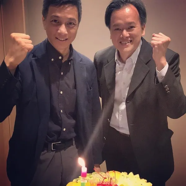 黃立聰與黃育仁
