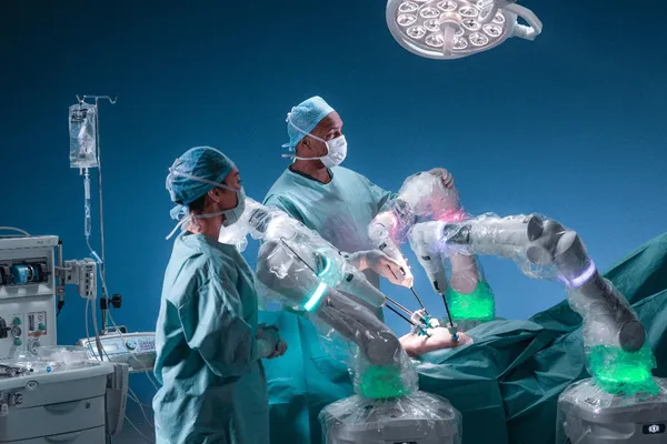 Versius in operating theatre with surgical team.jp