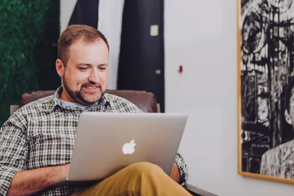 man using laptop